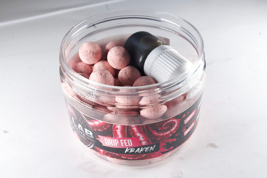 Kraken Wafters &amp; Pop-Ups



Kraken is an ultra-premium marine hook bait, developed using an uncompromising blend of the finest aquatic proteins, marine extracts and nutritional feeding triggers available. Built around a rich squid and octopus profile, it delivers an intense natural food signal that appeals to even the biggest and most pressured carp.



Every hook bait is hand cured and drip-fed for months, allowing a powerful infusion of hydrolysed squid extract, octopus extract, fish protein hydrolysa